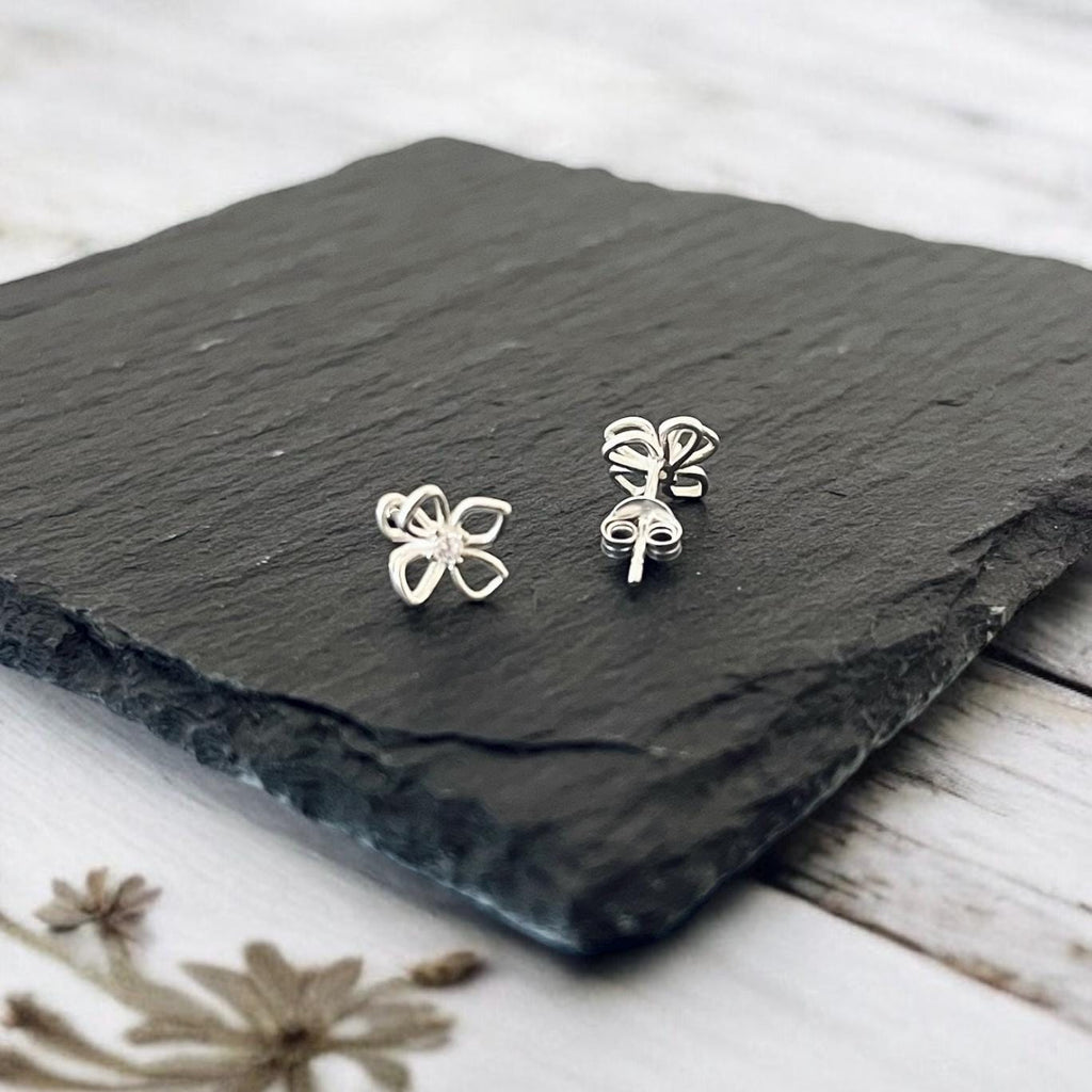 Sterling Silver Flower Stud Earrings: Cubic Zirconia Petal Design