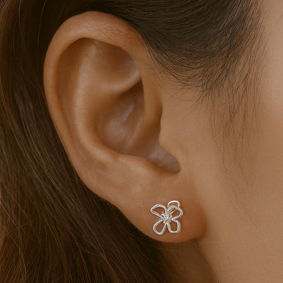 Sterling Silver Flower Stud Earrings: Cubic Zirconia Petal Design