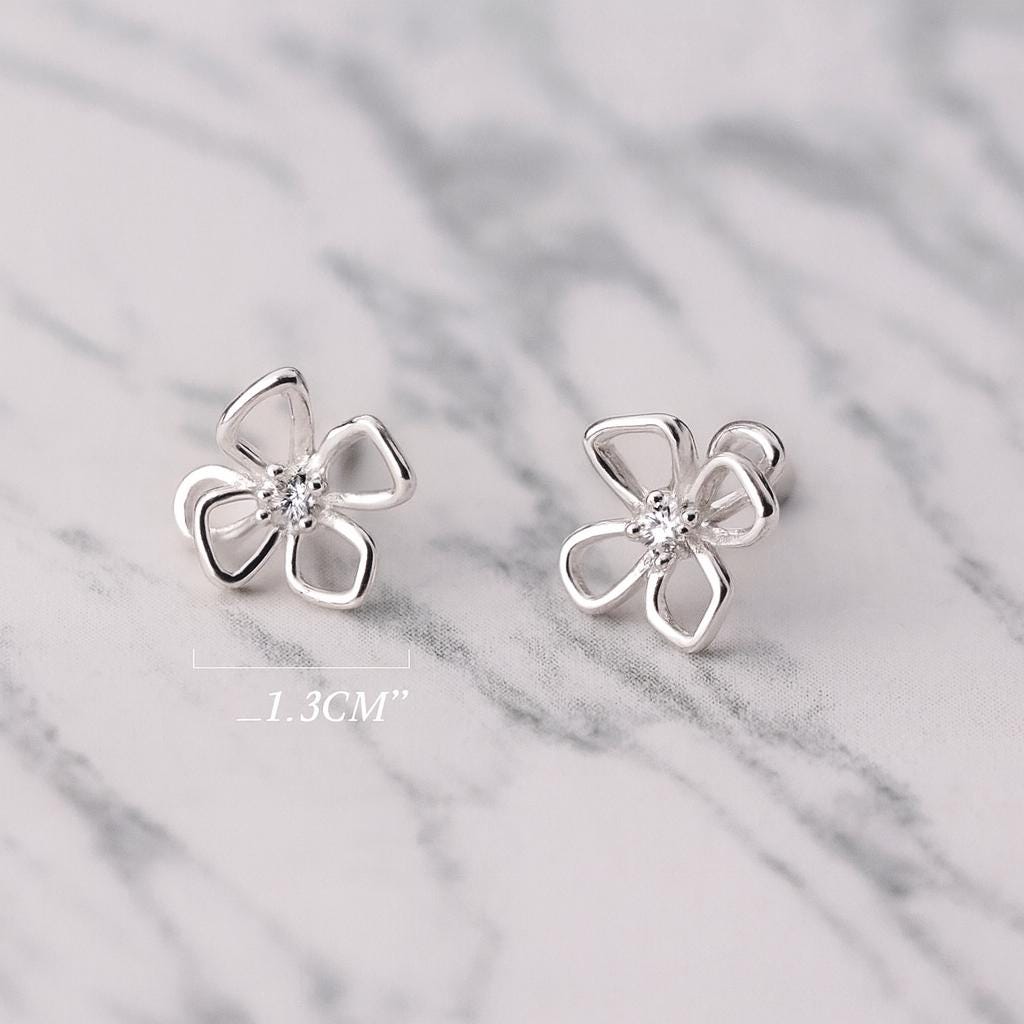 Sterling Silver Flower Stud Earrings: Cubic Zirconia Petal Design