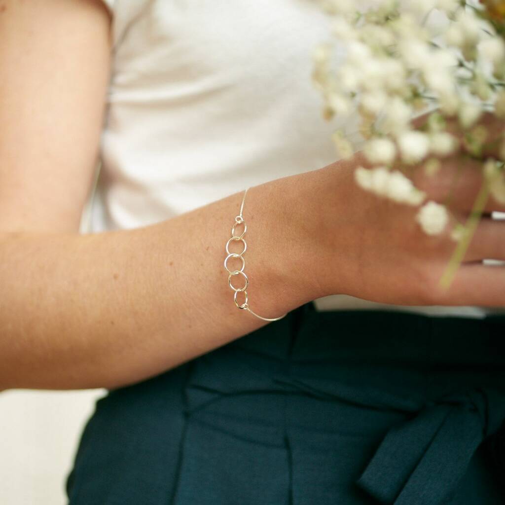 Premium Photo | Fashion gold bracelet isolated on wood background jewelry  gold luxury